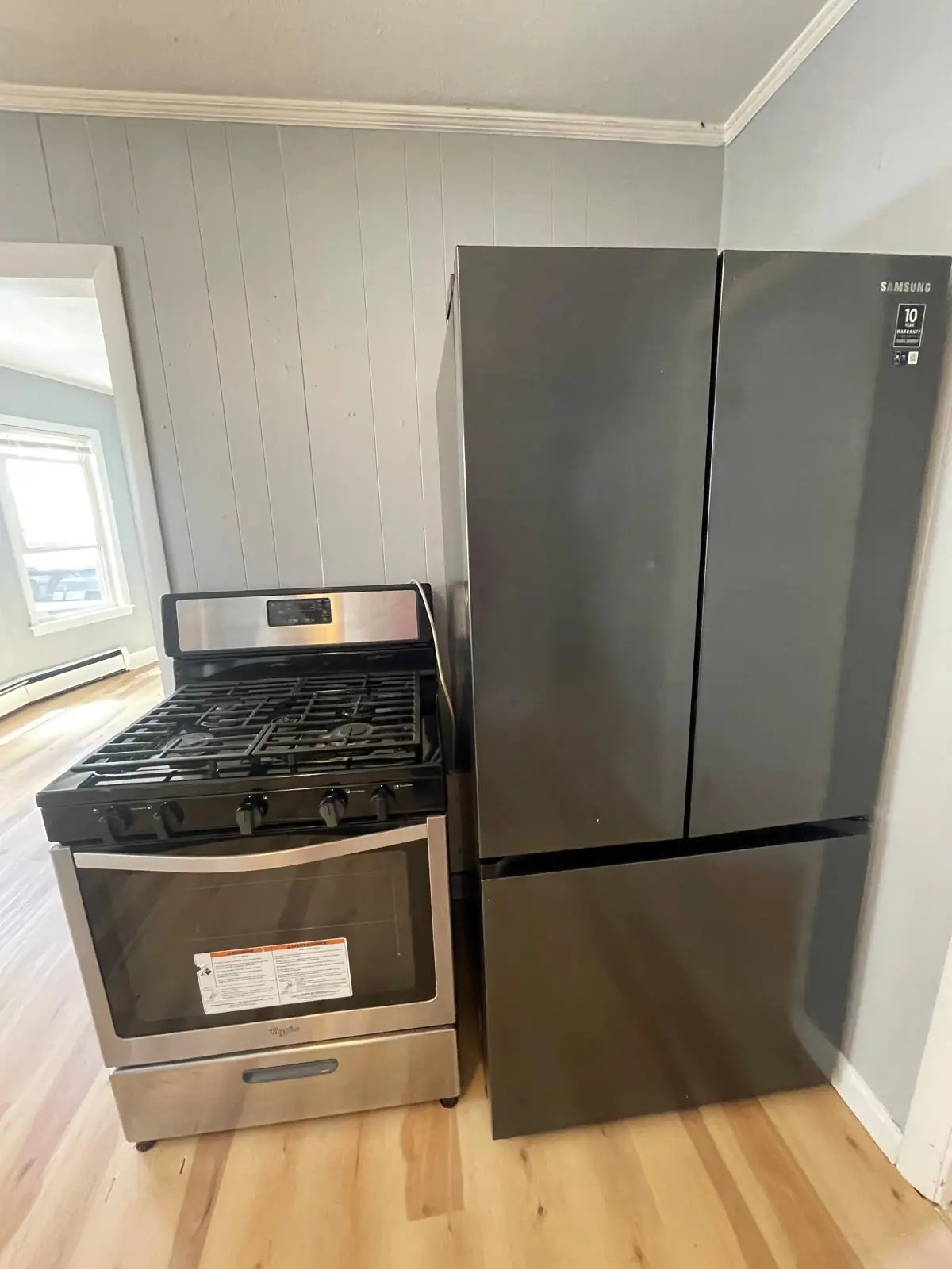 Clean stainless steel stove and refrigerator after cleaning in Clinton, MA